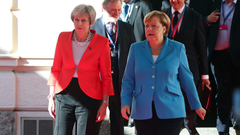 СМИ: Меркель проигнорировала приветствие Мэй на саммите в Зальцбурге