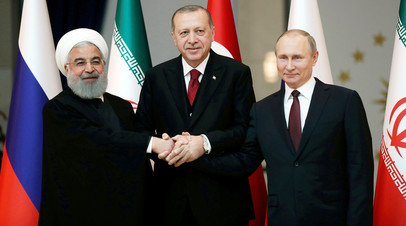 Президент РФ Владимир Путин, лидер Турции Реджеп Эрдоган и глава Ирана Хасан Рухани во время встречи в Анкаре
