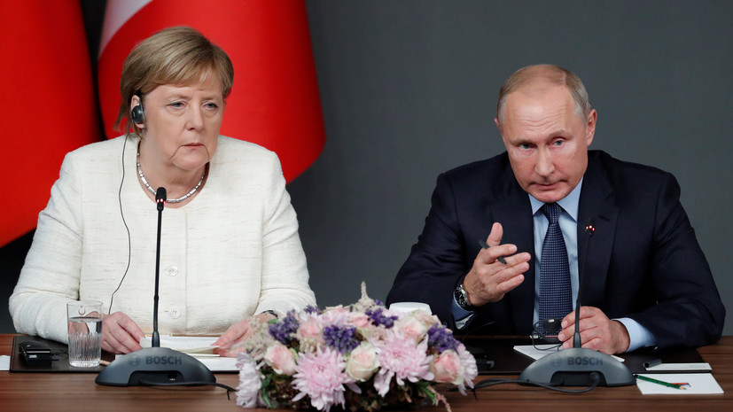 Украинский журналист осудил Меркель за рукопожатие с Путиным