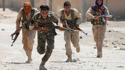 
Курдские бойцы из YPG, Сирия
