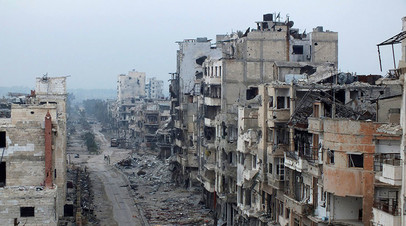 Разрушенные здания сирийского города Хомс