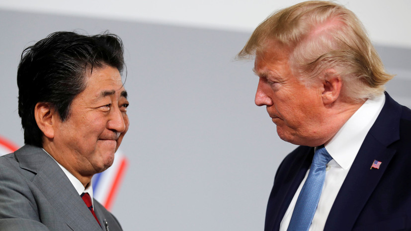 Абэ сообщил детали достигнутых соглашений по торговой сделке с США
