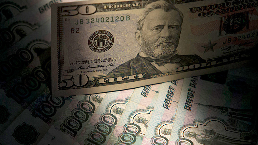 Печатный сбой: курс доллара США впервые с начала месяца опустился ниже 64 рублей