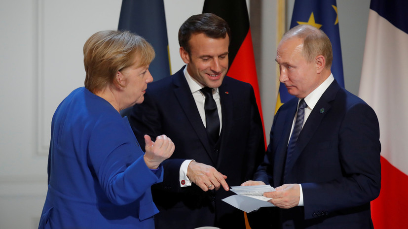 «Коммерсантъ»: Меркель в Париже назвала Путина победителем