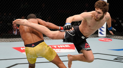 BUSAN, SOUTH KOREA - DECEMBER 21: (R-L) Said Nurmagomedov of Russia kicks Raoni Barcelos of Brazil in their bantamweight fight during the UFC Fight Night event at Sajik Arena 3 on December 21, 2019 in Busan, South Korea.