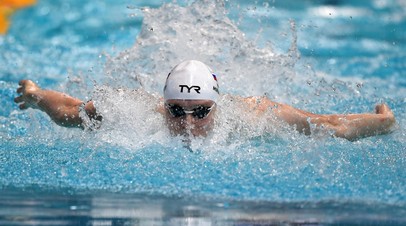 Андрей Минаков на дистанции 100 м баттерфляем в финальном заплыве среди мужчин на чемпионате России по плаванию в Казани.