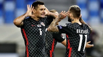 Футболисты сборной Хорватии Деян Ловрен и Марсело Брозович