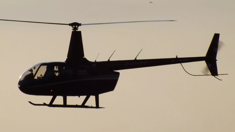 Направлявшийся к Каракольским озёрам вертолёт Robinson R-66 подал аварийный сигнал