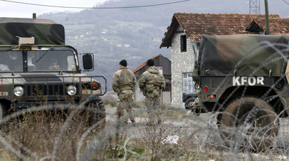 Американские солдаты, служащие в KFOR, на КПП на севере Косова и Метохии