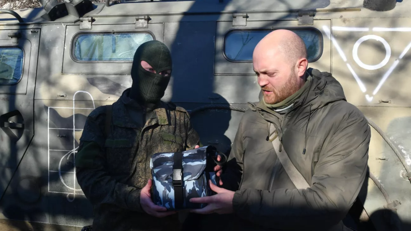 Военкор Коц рассказал о военнослужащих, стоявших за Путиным в новогоднем обращении