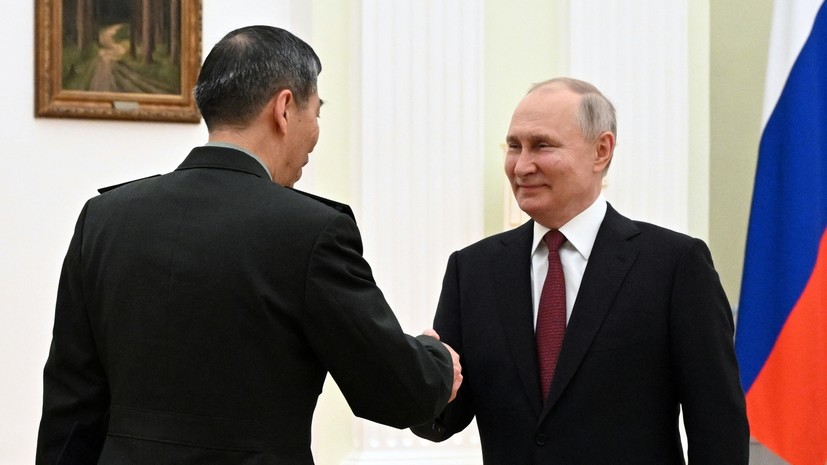BI: Путин показал США средний палец, когда провёл встречу с главой Минобороны Китая Шанфу