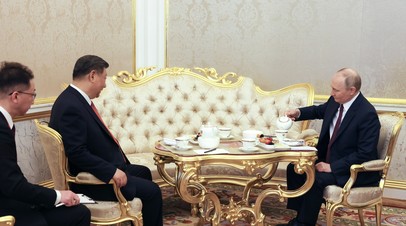 Путин и Си Цзиньпин проводят встречу в формате чаепития