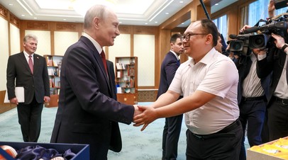 Пэн&nbsp; Пай: очень рад встрече с Путиным спустя 26 лет