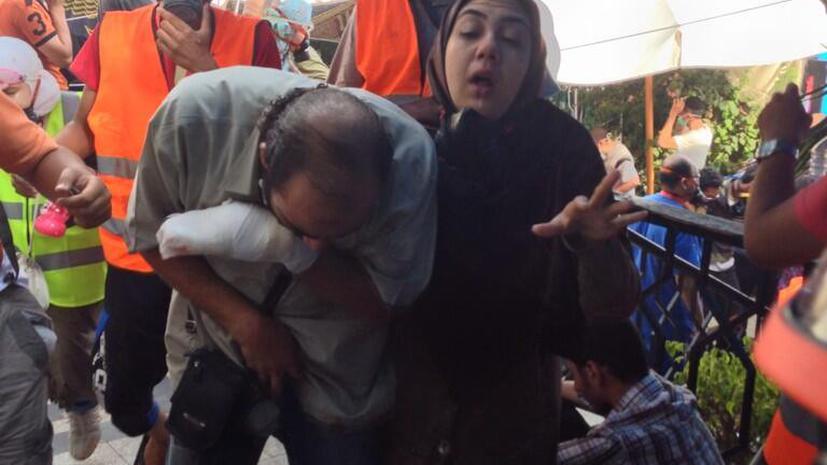 Для разгона сторонников Мурси полиция применила слезоточивый газ (ФОТОГАЛЕРЕЯ)