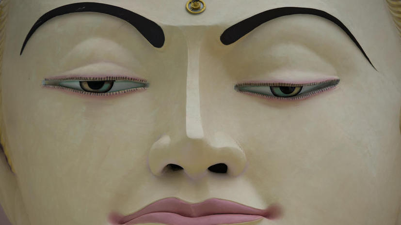 Спальные районы Чикаго защищаются от насилия скульптурами Будды