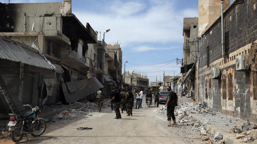 Сирийские войска окружили последние оплоты боевиков оппозиции в городе Хомс