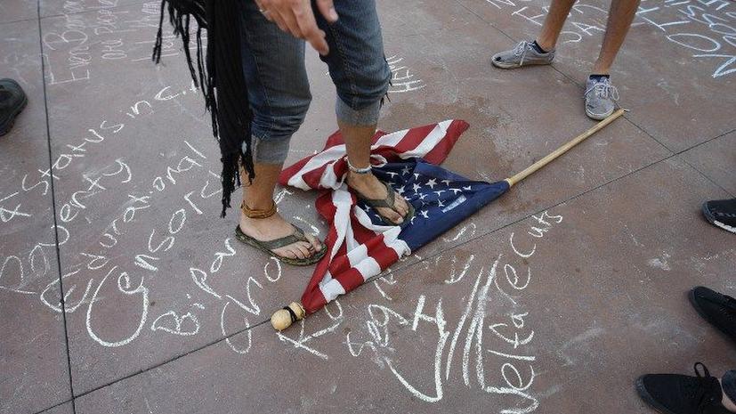 Присяжные в США оправдали участника движения Occupy, обвинявшегося  в избиении полицейского
